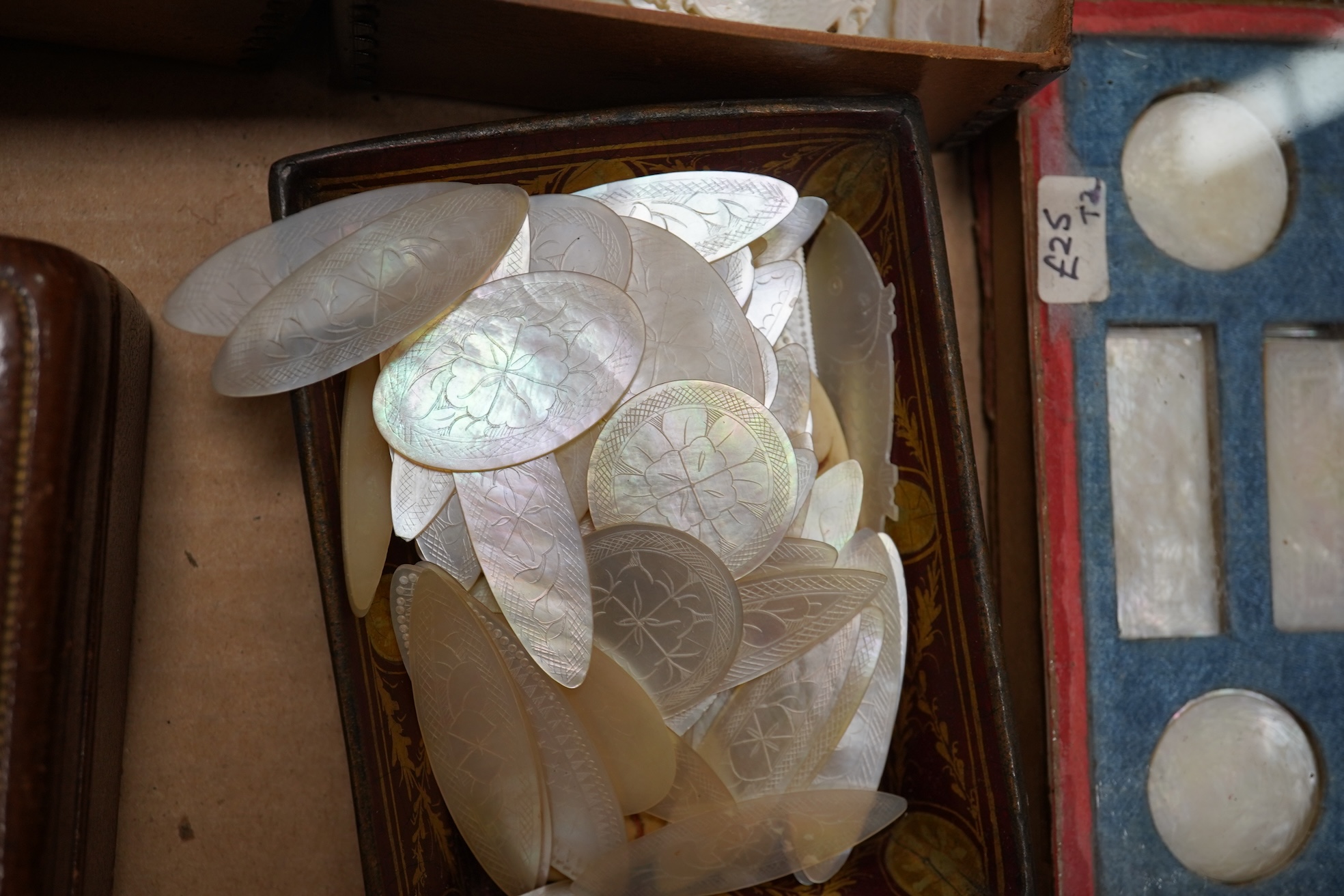 A group of 19th century Chinese mother of pearl gaming counters and accessories, together with a miniature silver cased compass